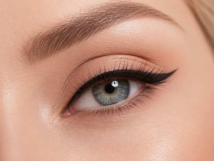 Permanent eyeliner lash enhancement close-up